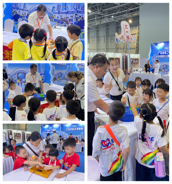 学会副秘书长龙建平指导幼儿园小朋友有序操作“触电体验仪”.jpg 学会副秘书长龙建平指导幼儿园小朋友有序操作“触电体验仪”.jpg